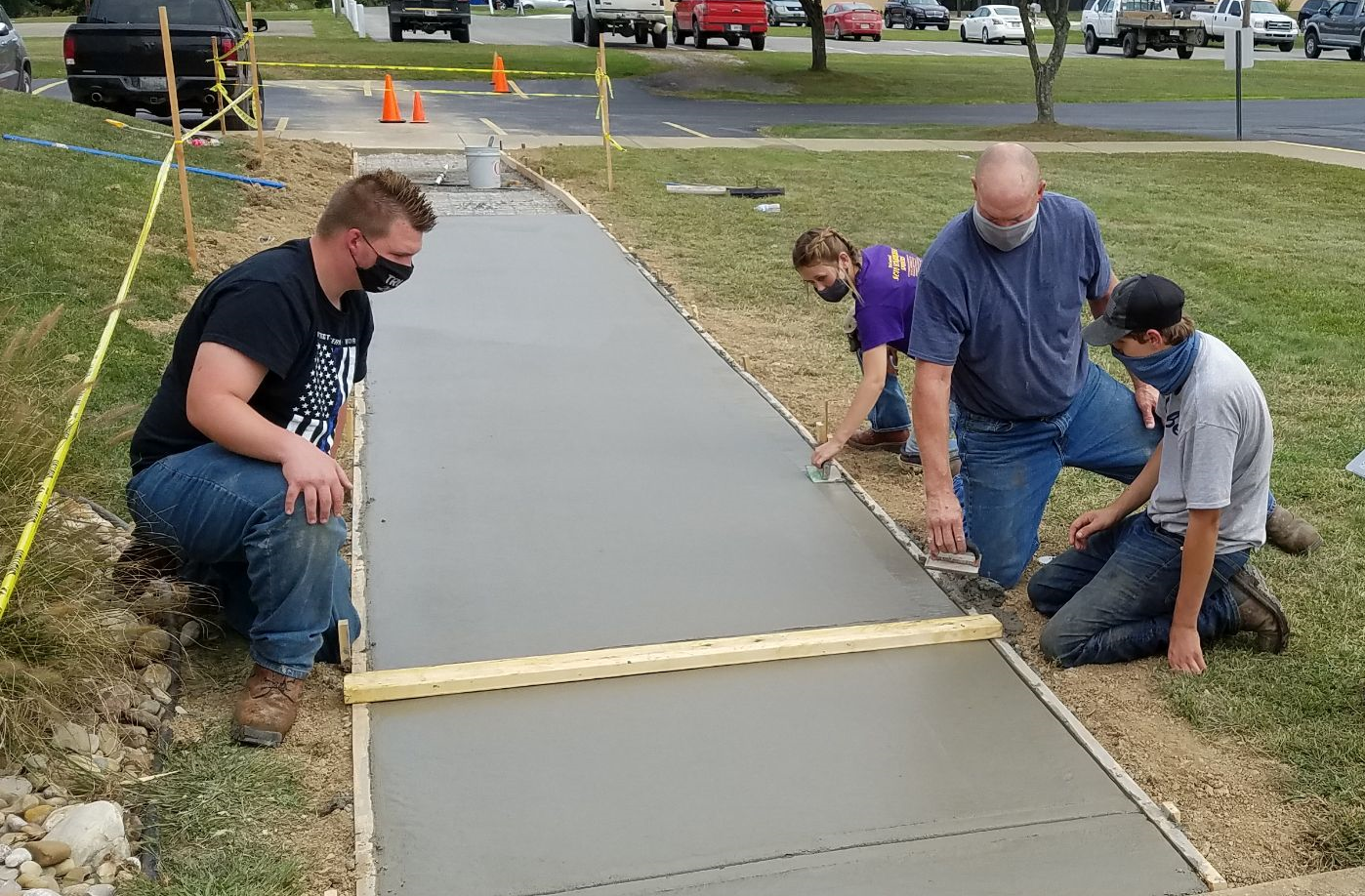 Construction Trades Students Work On Masonry Skills