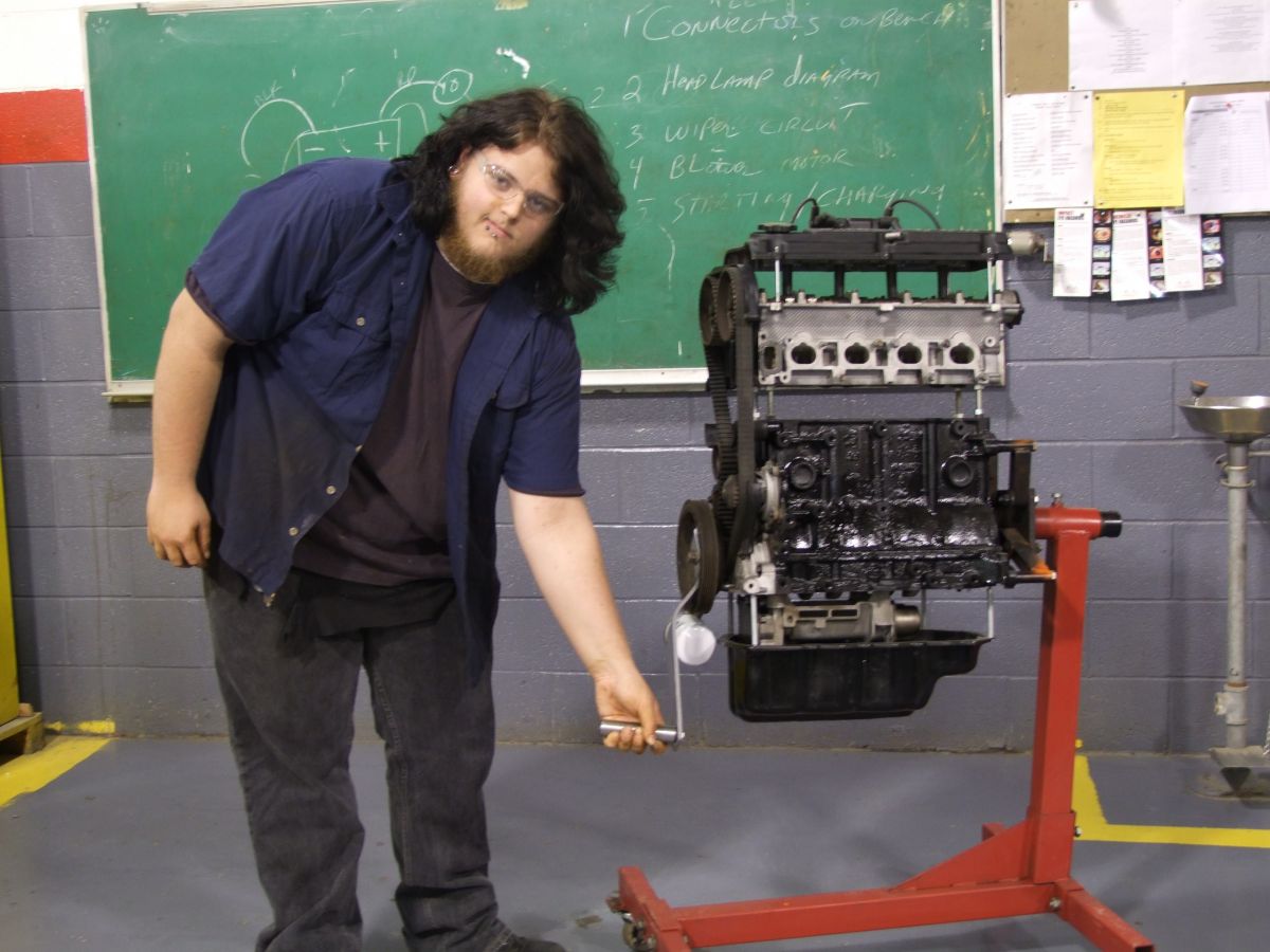 Dakota Hutchinson cranks his engine training aid.